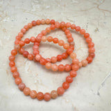 Kalcit orange, armband runda pärlor 6 mm