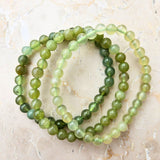 Ny jade, armband 6 mm pärlor