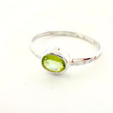 Peridot, square claw set ring