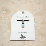 Blue topaz, birthstone for December silver pendant