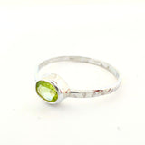 Peridot, square claw set ring