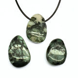 Emerald, large tumbled pendant with a hole
