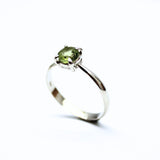 Peridot silver ring with faceted crystal