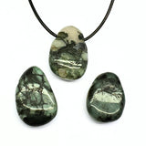 Emerald, large tumbled pendant with a hole