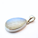 Rainbow moonstone, small oval pendant in plain silver