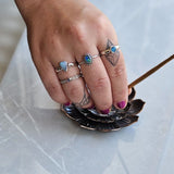 Opal ring with silver edge