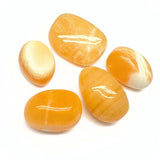 Kalcit orange, trumlad