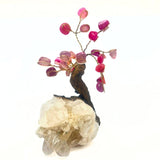 Bonsai tree with rose quartz on a rock crystal base