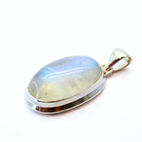 Rainbow moonstone, small oval pendant in plain silver