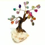 Bonsai tree with gemstones on rock crystal base