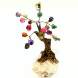 Bonsai tree with gemstones on rock crystal base