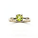Peridot silver ring with faceted crystal
