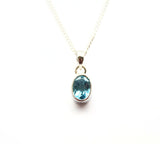 Blue topaz, birthstone for December silver pendant