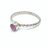 Opal with twisted silver ring