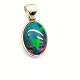 Opal, oval silver pendant with small silver edge