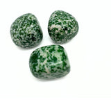Jade with white spots from China per gram