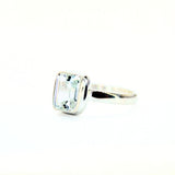 White topaz rectangular facet in silver ring