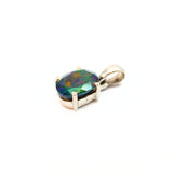 Opal, svart fasetterad kloinfattad fantastisk sten med magiskt glitter