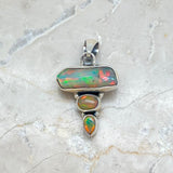 Opal - three stones in gold