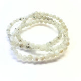 Rainbow pattern white bracelet with round beads