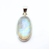 Rainbow moonstone, small oval pendant in plain silver