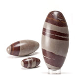 Shiva lingam, useita kokoja